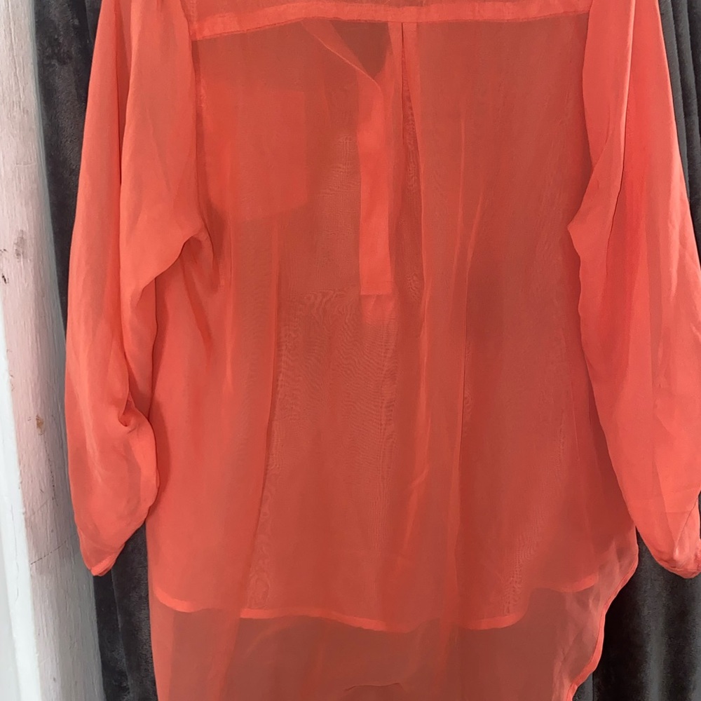 women orange blouse size large